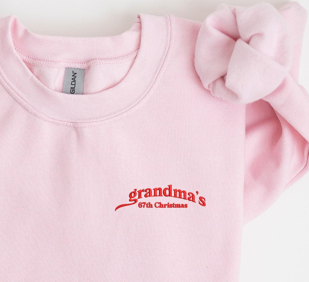Grandma’s Christmas Embroidered Sweatshirt, Personalized Holiday Crewneck, Custom Year Gift, Pink Cozy Pullover