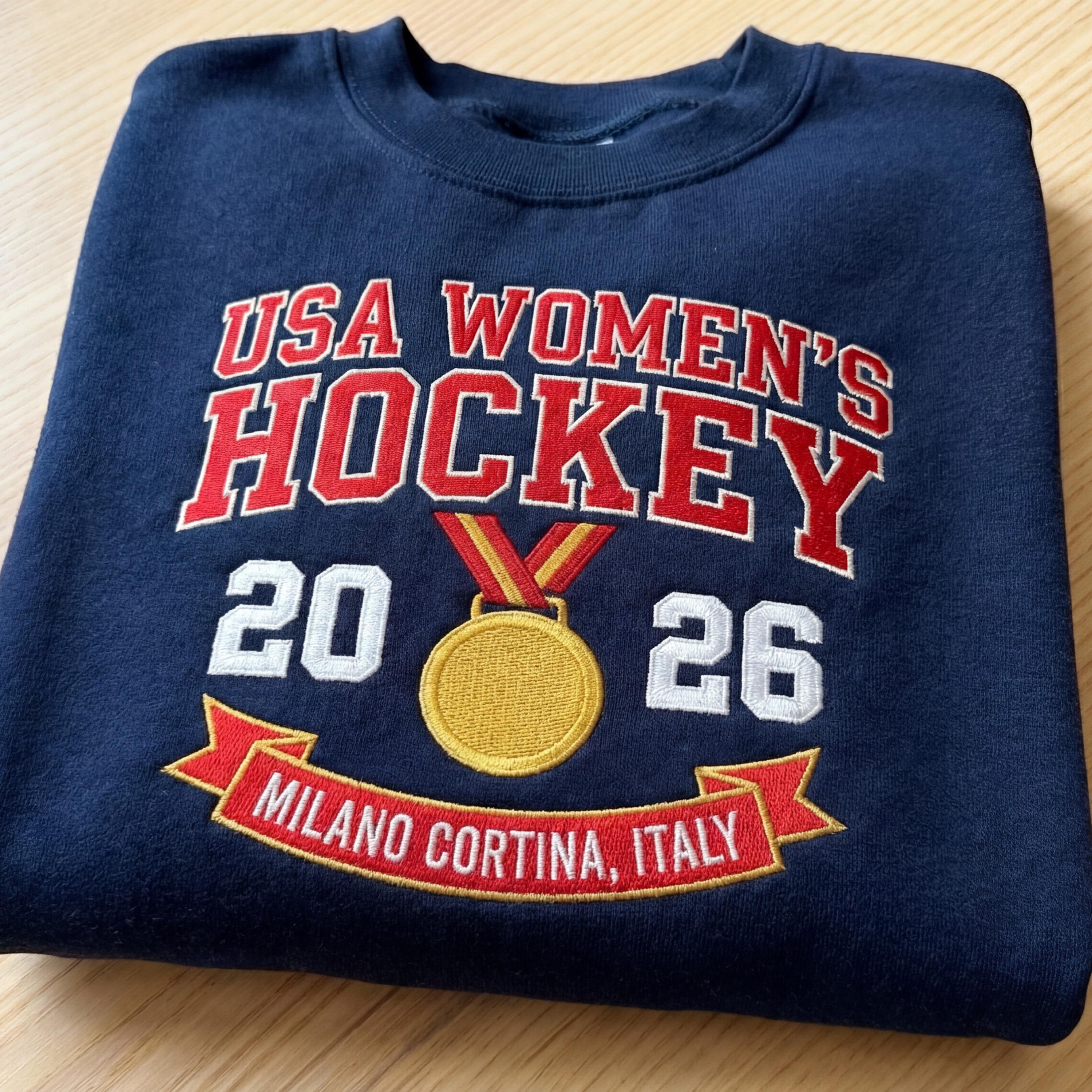 USA Woman's Hockey Champions 2026 Gold Medal Embroidered Sweatshirt, Patriotic Red White Blue Women's Winter Sports Fan Crewneck