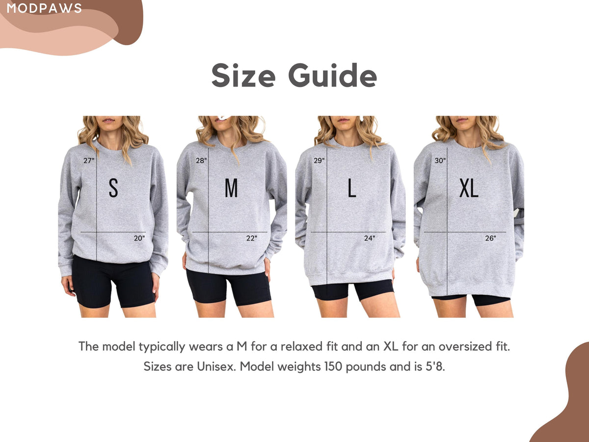 May include: A size guide for grey crewneck sweatshirts featuring four images labeled S, M, L, and XL. Each sweatshirt displays length and width measurements in inches. The text states the model weighs 150 pounds, is 5'8, and wears size M or XL.